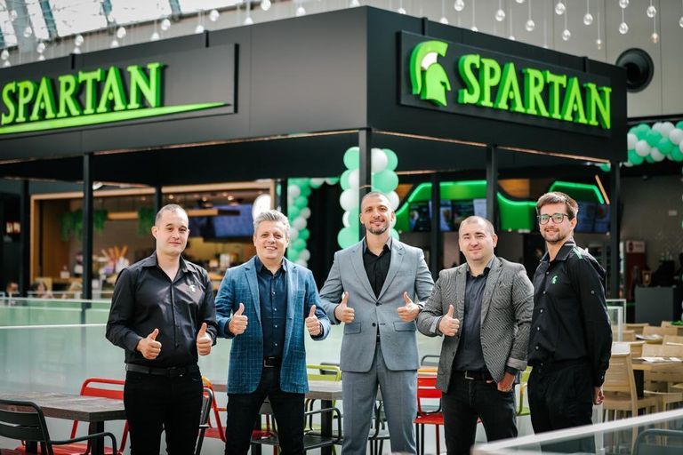 Comunicat de presă – Spartan, cea mai mare franciză românească de fast-food, se extinde în Spania, la Barcelona.