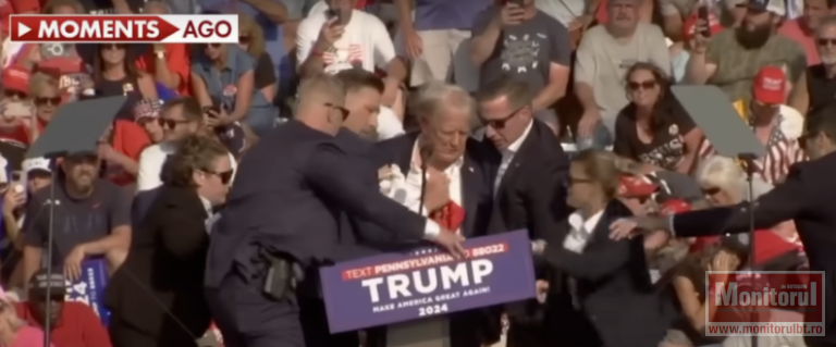 Donald Trump, împușcat în ureche într-o tentativă de asasinat la un miting electoral. O persoană a murit, iar alte două sunt grav rănite (video)