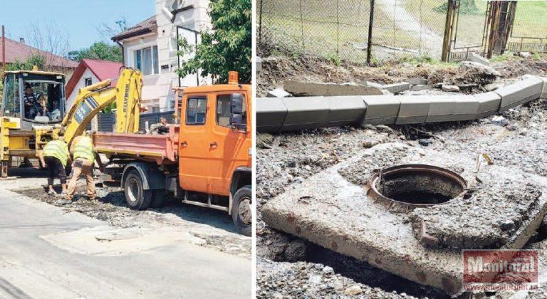Bani îngropaţi în străzi care se rup (VIDEO)